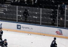 ice hockey players on ice hockey field